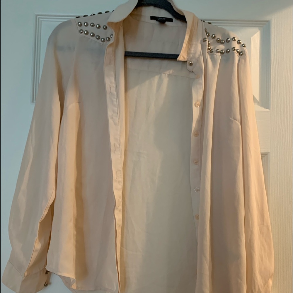 Cream blouse with silver accents on sleeve